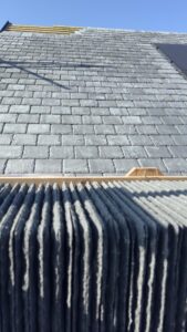 Ravendale blue-grey Brazilian roofing slate on modern UK home